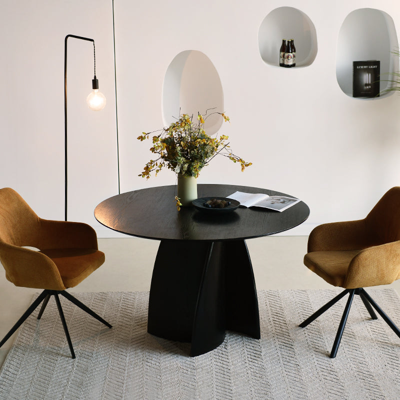 Tavolo da pranzo rotondo Gemma UDT24012 in nero con piano MDF resistente e base in impiallacciato legno, perfetto per sale da pranzo moderne.